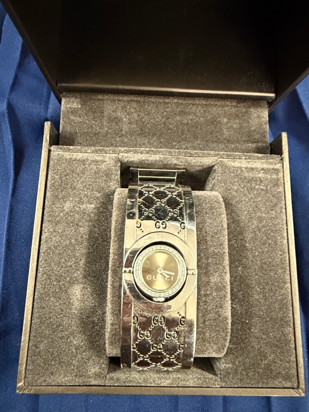 Gucci Silver Tone GG Engraved Bangle Watch with Champagne Dial